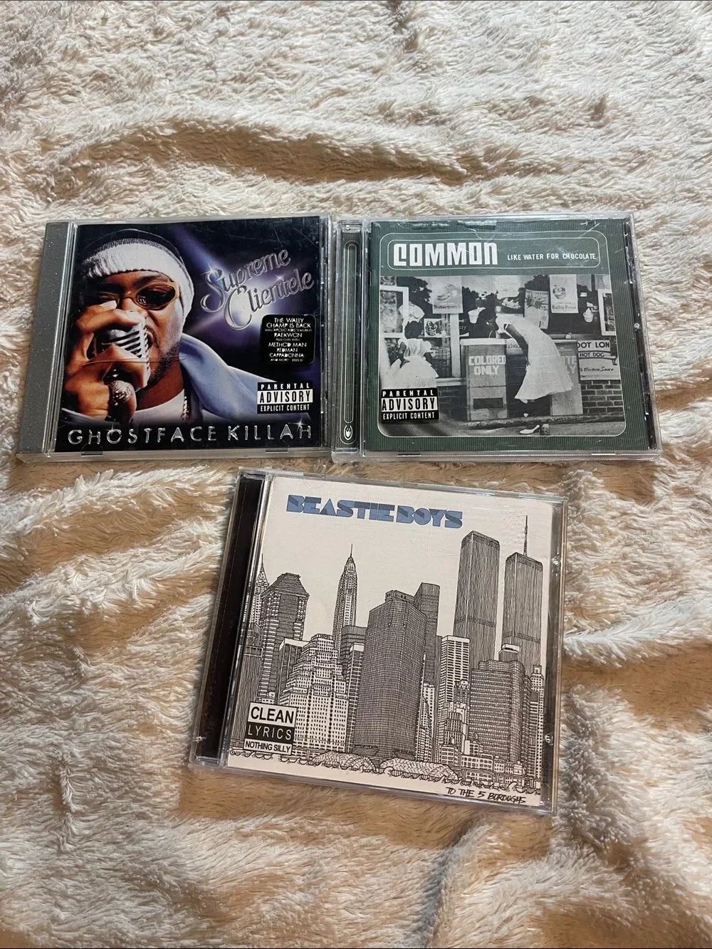 Three Hip-Hop CDs - Ghostface Killah, Common, Beastie Boys - Black, Green, White